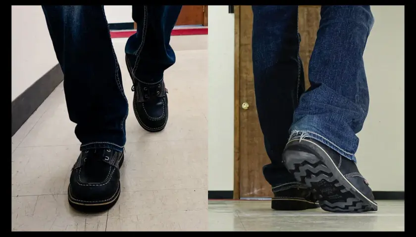 Close-up of feet in jeans and dark shoes. The shoes are made of what looks like real leather, and you can almost hear them squeak with every step.