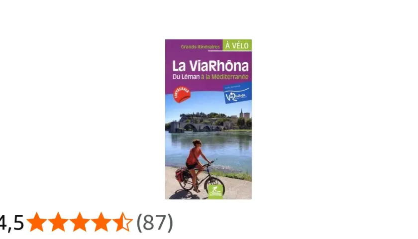 Guía de la ViaRhôna, un recorrido ciclista del lago Lemán al Mediterráneo. Una ciclista pedalea junto al río Ródano.