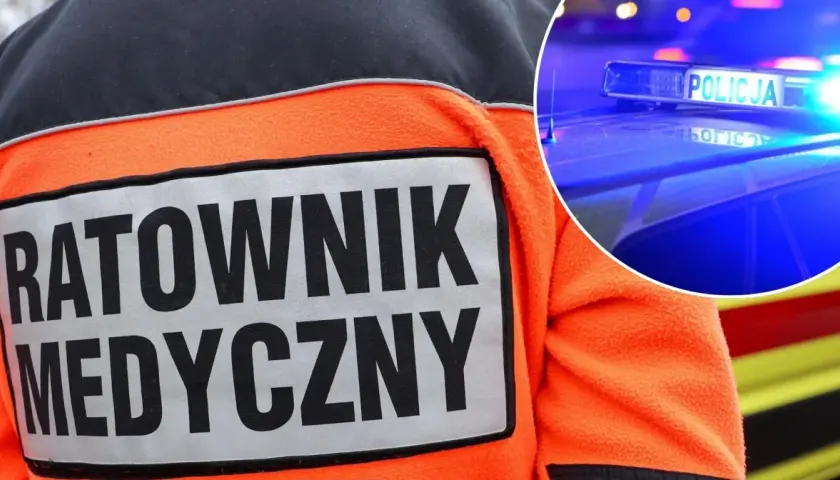 Ratownik medyczny w pomarańczowej kurtce, obok policyjny kogut kierunkowy 25.