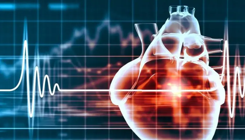 Przezroczyste serce na tle wykresu EKG, symbolizujące działanie leków takich jak digoxin, które regulują rytm serca.