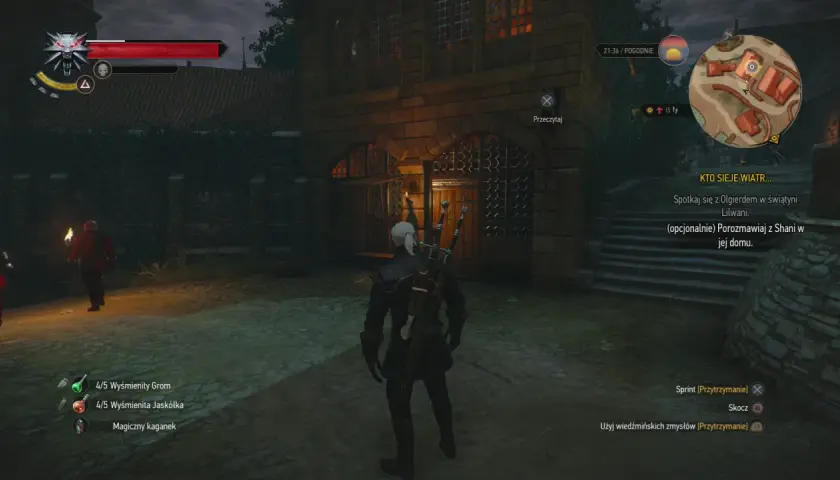 Geralt stoi przed kamienną budowlą, gdzie czeka go serce z kamienia zakończenia misji. W tle widać strażnika z pochodnią.