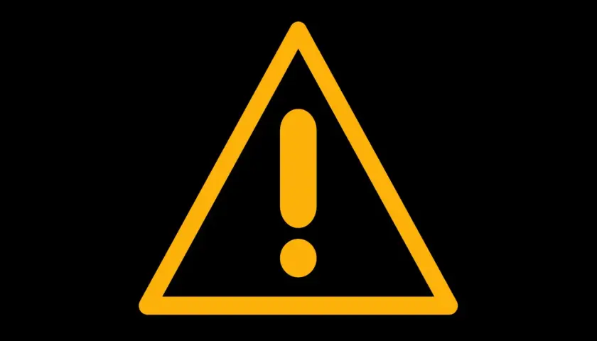 Triángulo amarillo con signo de testigo de exclamación, como el de un Volkswagen, indica precaución.