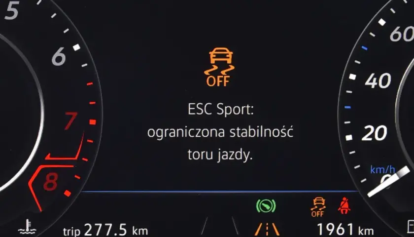 Wyświetlacz informuje, co oznacza ESP w samochodzie: ESC Sport z ograniczoną stabilnością toru jazdy.