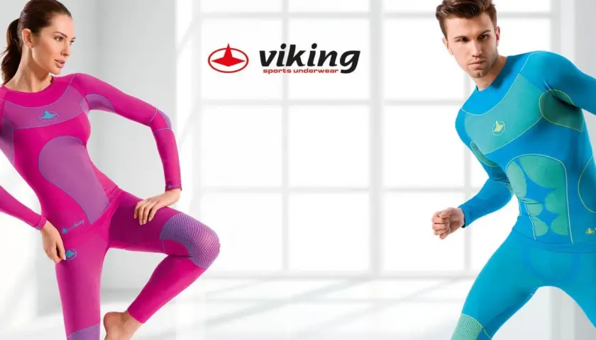 Kobieta w różowym i mężczyzna w niebieskim stroju sportowym. Bielizna termoaktywna Viking dla aktywnych.