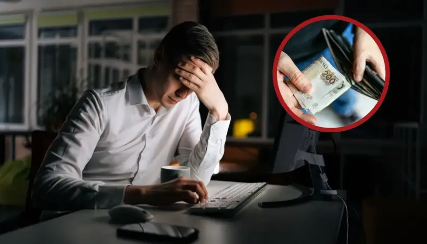 Zmartwiony mężczyzna przy komputerze, w dłoniach pieniądze. Czy wypowiedzenie za porozumieniem stron a urlop to dobry pomysł?