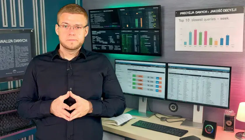 Mężczyzna w okularach przed ekranami z wykresami i danymi. Analiza danych, optymalizacja zapytań **sql**.