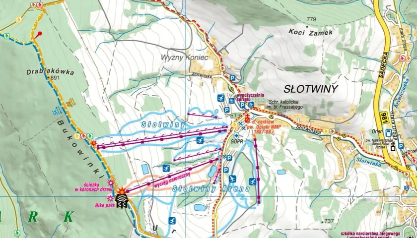 Mapa Krynicy-Zdroju pokazuje góry Beskidu Sądeckiego, z trasami narciarskimi i rowerowymi w Słotwinach.