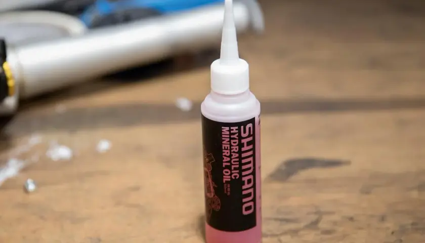 A bottle of Shimano hydraulic mineral oil, questioning if all mineral oil is the same.