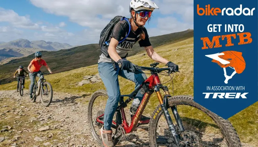 Cyclists ride mountain bikes on a rocky trail. Learn how to build a mountain bike with BikeRadar and Trek.