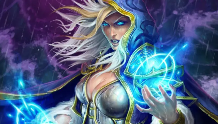 Jaina Proudmoore, czarodziejka z niebieskimi oczami, rzuca zaklęcie. Jej moc jest równie potężna jak siła primaris space marines.
