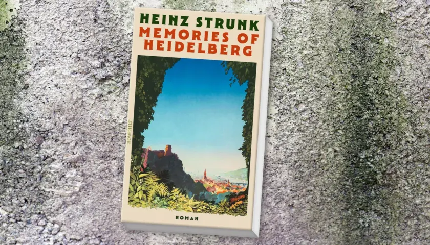Heinz Strunk neues Buch: "Memories of Heidelberg" Roman, ein Blick auf die malerische Stadt mit Schloss und Neckar.