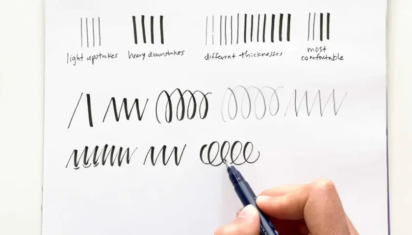 Práctica de **letra inglesa** con trazos ligeros, gruesos, de diferentes grosores y el más cómodo. Se muestran espirales y zigzags.