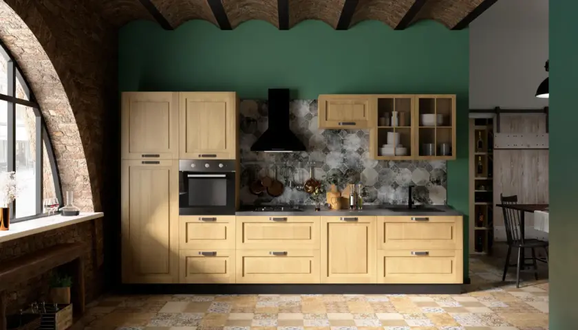 Cucina moderna con mobili in legno chiaro, parete verde smeraldo e soffitto a volta in mattoni. Ottime idee pittura cucina per un look rustico e contemporaneo.