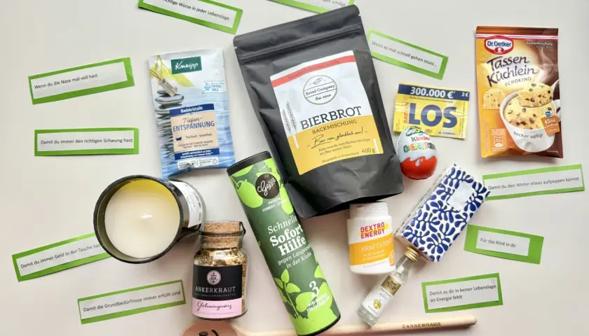 Ein liebevolles Geschenk-Set zum 70. Geburtstag für einen Mann: Bierbrot-Backmischung, Kerze, Gewürze, Badesalz und mehr.