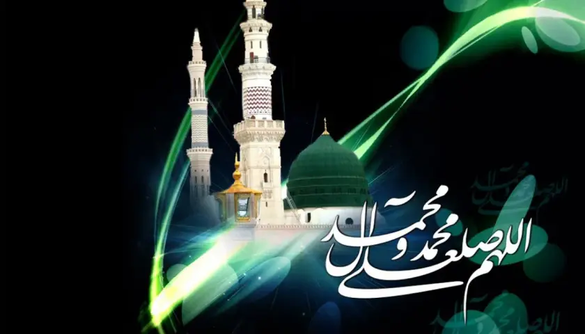 Grön kupol och minareter med arabisk kalligrafi som hyllar profeten Muhammed.