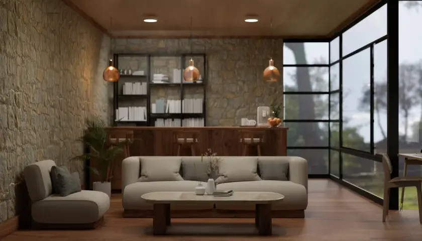 Przytulny salon z kamienną ścianą, gdzie oświetlenie kamienia dekoracyjnego tworzy ciepłą atmosferę. Wygodna sofa i fotel zapraszają do relaksu.