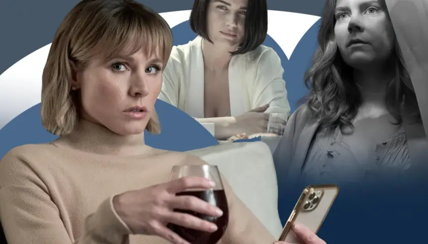 Kvinnan i huset mittemot flickan i fönstret, med ett glas vin och en telefon.
