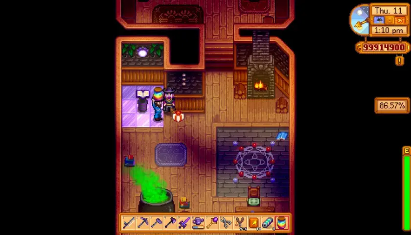 Gracz w Stardew Valley tworzy magiczny eliksir, z którego unosi się zielona para. Obok stoi kocioł, a na podłodze magiczny krąg.
