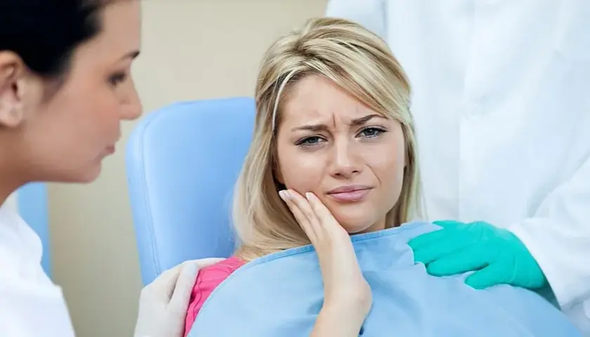 Ból zęba po zatruciu: Jak sobie radzić i kiedy do dentysty?