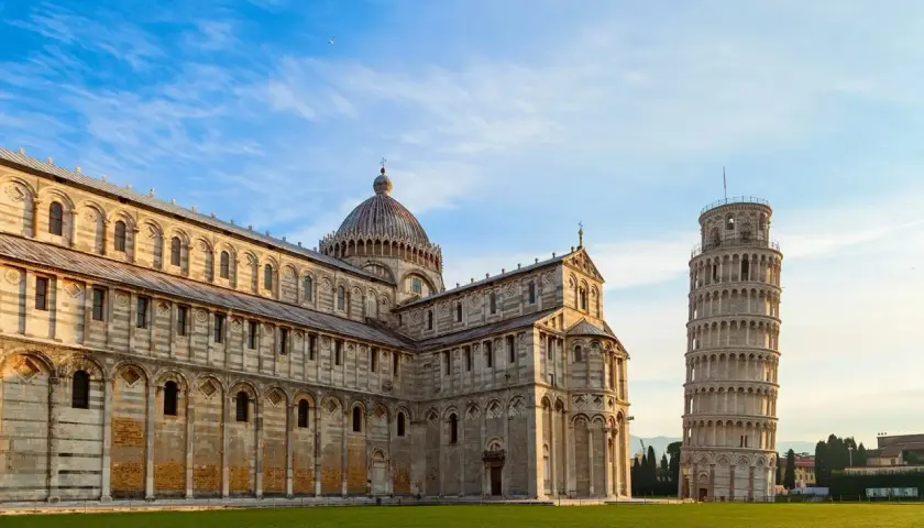 The Leaning Tower of Pisa stands proudly next to the cathedral, a must-see landmark after arriving at Pisa Airport.