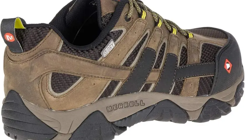 Brown Merrell Moab Vent hiking shoe with yellow laces and a "M-Dry" logo. Ready for any adventure!