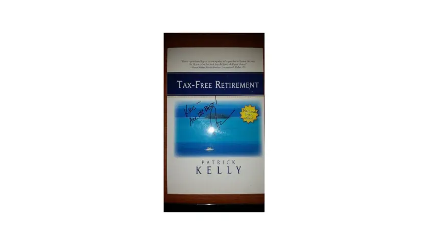 Książka "Tax-Free Retirement" Patricka Kelly'ego, z dedykacją "Kris, all the best!". Wartość tej wiedzy jest jak dobre obligacje PKO - pewna inwestycja w przyszłość.