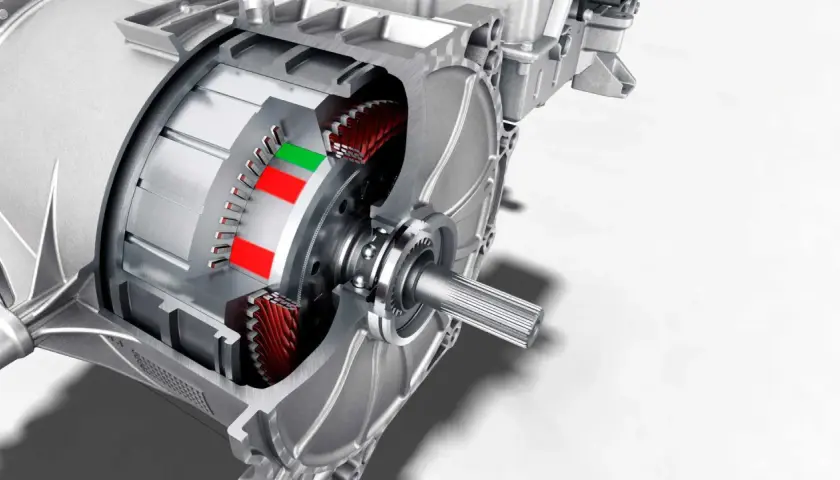 Sezione di motori elettrici per auto, mostrando rotore, statore e ingranaggi.