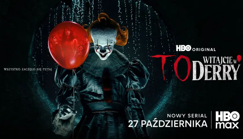 Pennywise z czerwonym balonem na tle mrocznego kanału. Napis "TO".