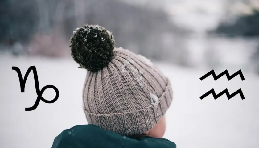 Znak zodiaku styczeń: Koziorożec i Wodnik na tle zimowego krajobrazu.