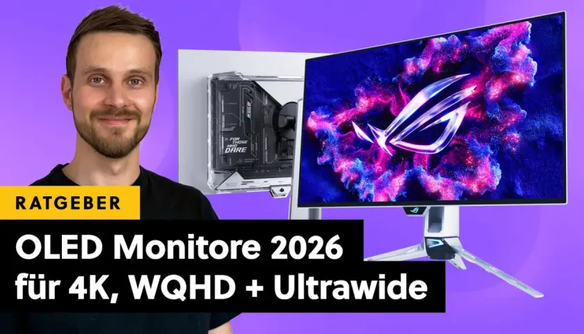 Mann lächelt neben einem PC-Gehäuse und einem OLED Monitor Test mit ROG-Logo. Der Text "OLED Monitore 2026" ist sichtbar.
