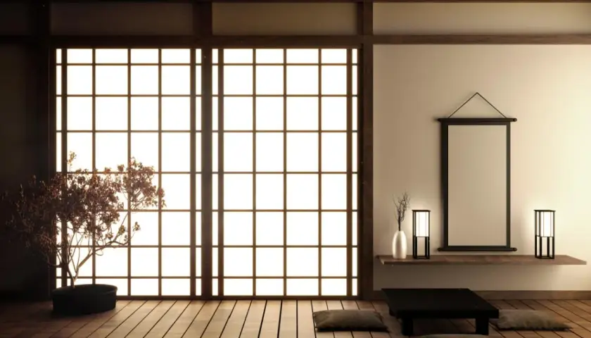 Minimalist Japanese room with shoji screen, bonsai tree, and low table.