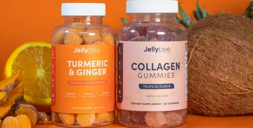 Gomitas de colágeno Jellybee sabor tropical y cúrcuma con jengibre, junto a frutas tropicales. ¡Tu aliado para el bienestar, como los que encuentras en Mercadona!
