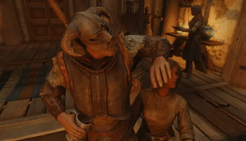 W Skyrim, pomoc w potrzebie. Zbrojny Nord zasłania oczy kobiecie, gdy inni krzątają się w tle.