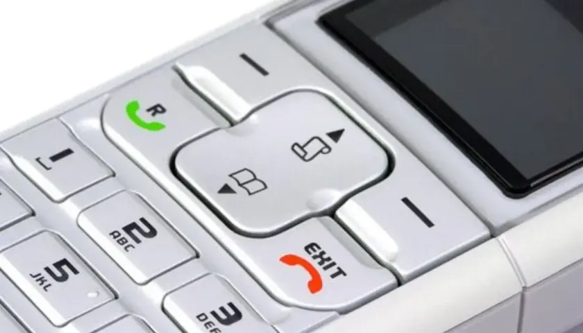 Telefon z klawiaturą numeryczną i przyciskiem "EXIT". Możesz nagrać wiadomość na poczta głosowa play.