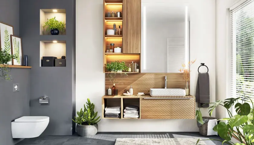 Modernes Badezimmer mit Hänge-WC, Waschtisch und vielen grünen badezimmer pflanzen, die für Frische sorgen.