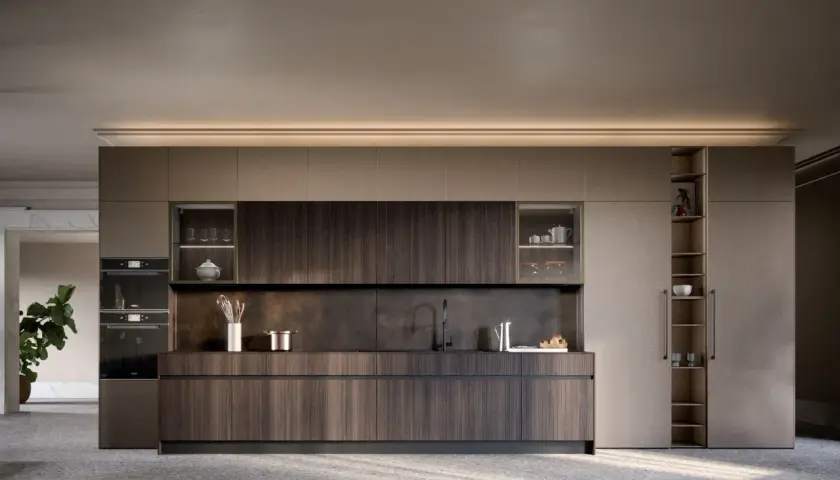 Cucina moderna con finiture in legno scuro e pensili a scomparsa. Un esempio di come abbellire una cucina moderna con stile e funzionalità.