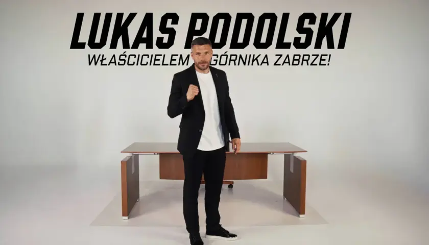Łukasz Podolski, właściciel Górnika Zabrze, w garniturze. Plotki transferowe w klubie nabierają tempa.