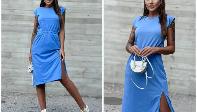 Kobieta w niebieskiej sukience i białych sneakersach. Idealne połączenie, jeśli zastanawiasz się, jakie buty do niebieskiej sukienki pasują na co dzień.