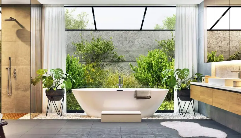 Modernes Badezimmer mit freistehender Wanne, Dusche und viel Grün. Eine wahre **Badezimmer Wellness Oase** mit Blick ins Grüne.