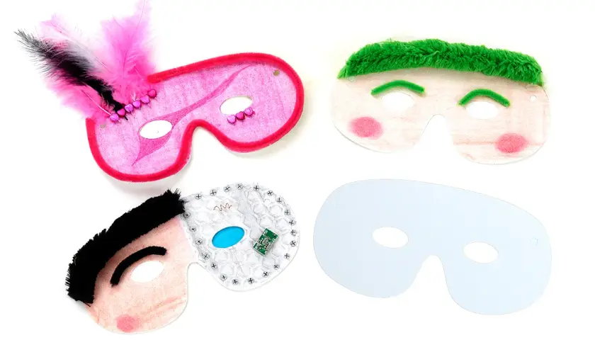 Kreative Ideen zum **masken bemalen**: bunte Masken mit Federn, grünen Haaren und sogar einer kleinen Platine.