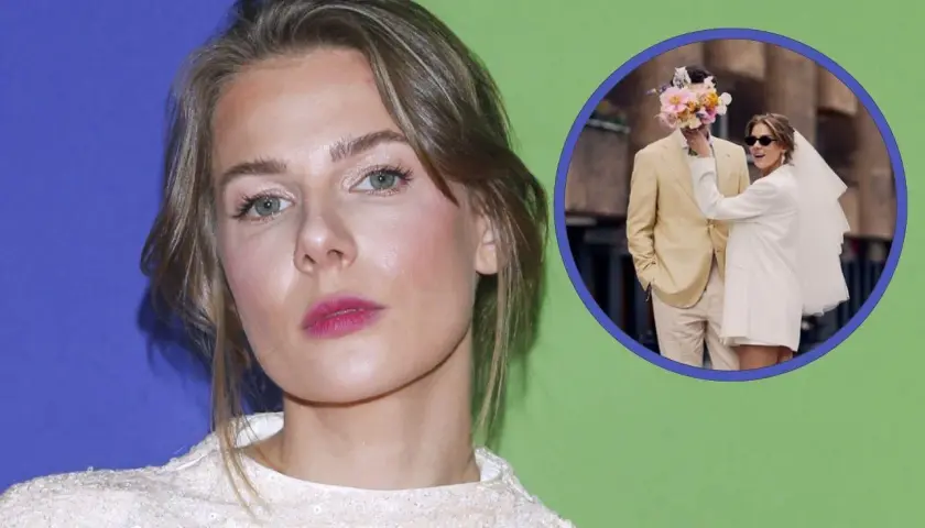 Marta Wierzbicka z mężem w dniu ślubu, ona w białej sukience i welonie, on w beżowym garniturze.