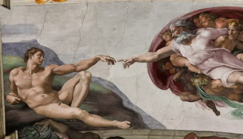 Gott berührt Adam. Die Szene erklärt, warum glauben Menschen an Gott: die Sehnsucht nach Verbindung und Schöpfung.