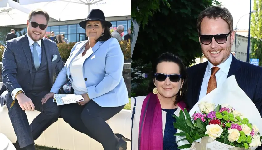 Para na zdjęciu, Helena Mańkowska i jej towarzysz, uśmiechają się do obiektywu. Helena ma na sobie jasnoniebieską marynarkę i czarny kapelusz.
