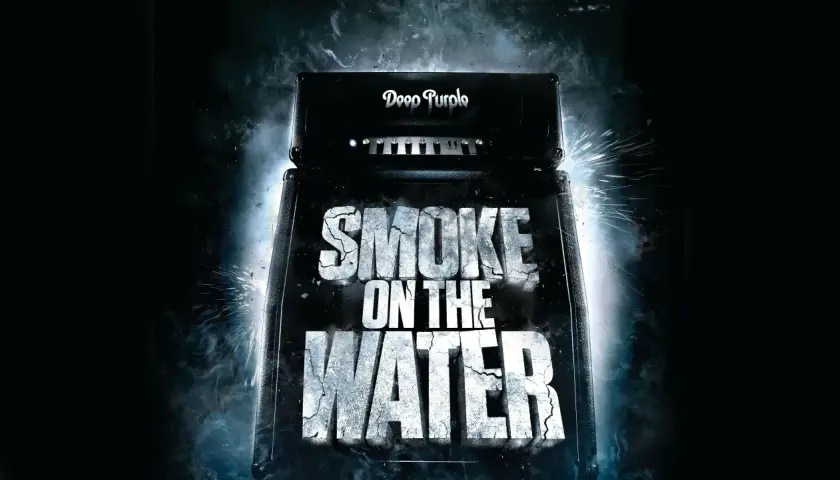 Głośnik z logo Deep Purple i napisem "SMOKE ON THE WATER". Wokół kłęby dymu i iskry.