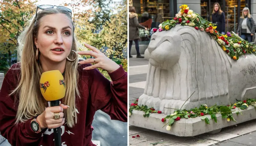 En ung kvinna med mikrofon och en stenlejon prydd med blommor. En saga från Berlin.