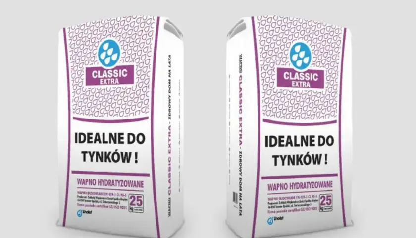 Dwie torby z napisem "wapno budowlane Classic Extra", idealne do tynków. Produkt wysokiej jakości, zdrowy dom na lata.