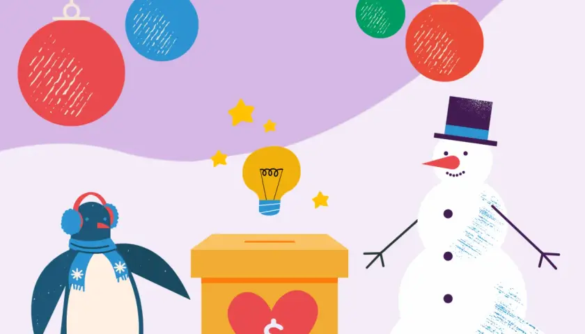 A penguin and snowman stand by a donation box, surrounded by holiday ornaments. This image sparks holiday charity ideas, with a lightbulb symbolizing inspiration.