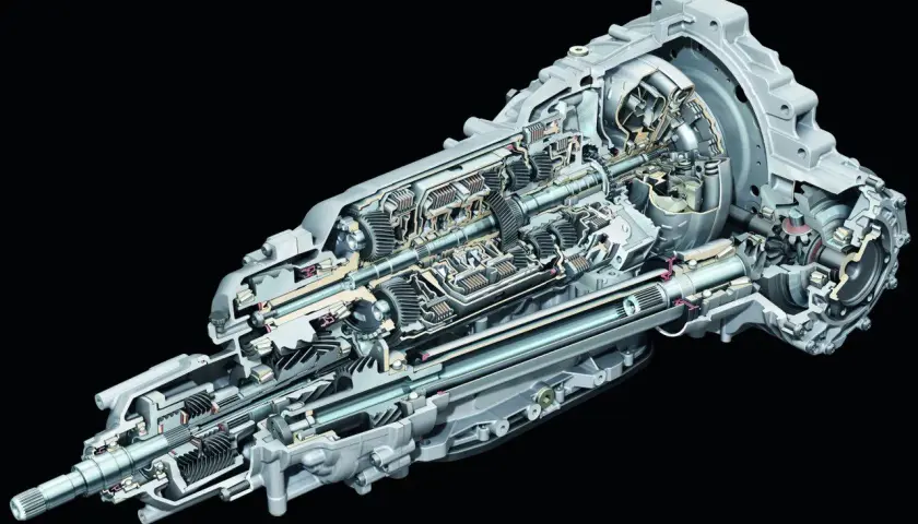 Sezione interna di un cambio Tiptronic Audi, mostrando ingranaggi complessi e componenti meccanici.
