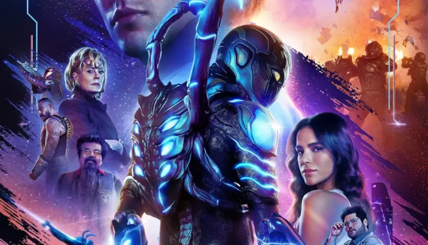 Affiche du film Blue Beetle, avec le héros en armure bleue lumineuse. On y voit aussi les acteurs principaux. La date de sortie de Blue Beetle 2 n'est pas encore annoncée.