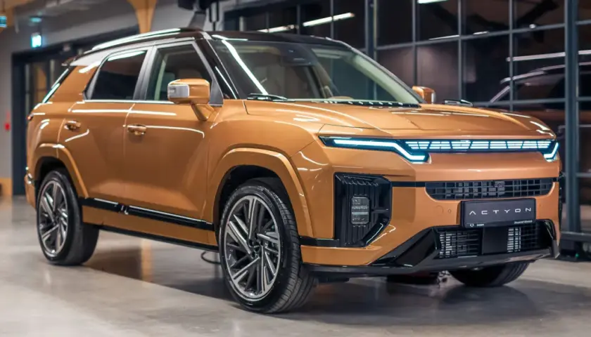 Pomarańczowy SUV z nowoczesnym designem, jeden z nowych koreańskich marek aut.